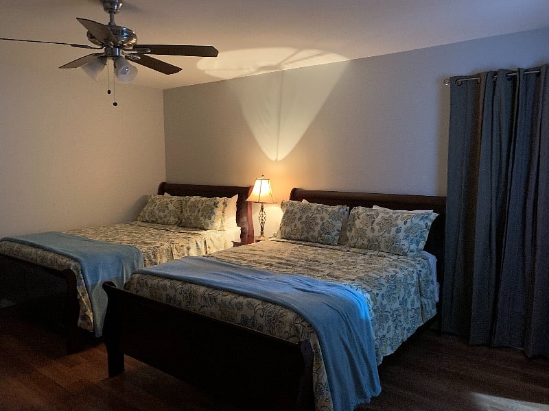 The bedrooms include queen size bed. This bedroom has a private bathroom with tub/shower combination.