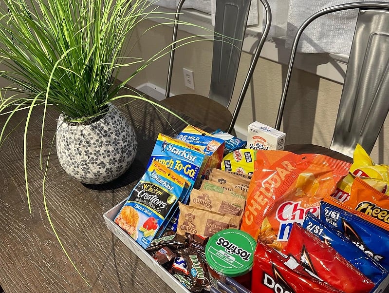 Three (3) simple personalized snacks are accommodated for welcoming gift