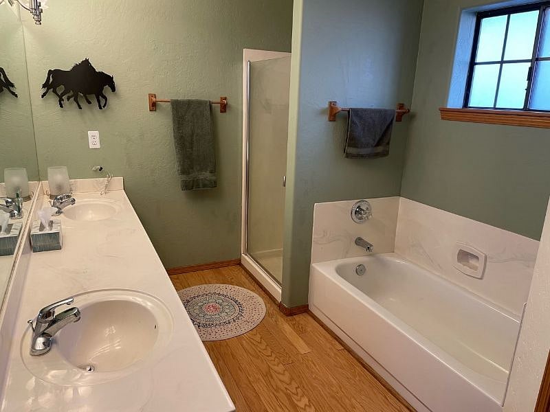 Private bathroom with shower and double sink