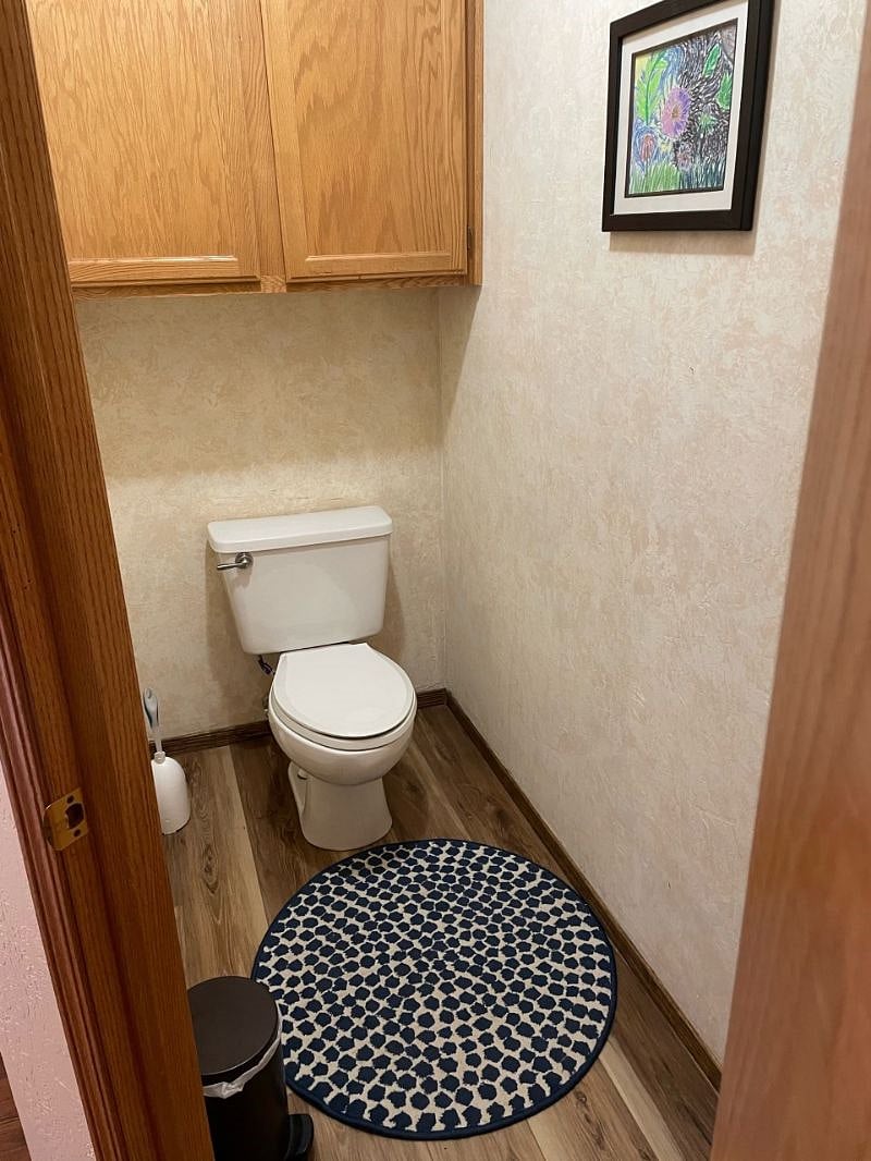 Separate toilet room next to main bathroom
