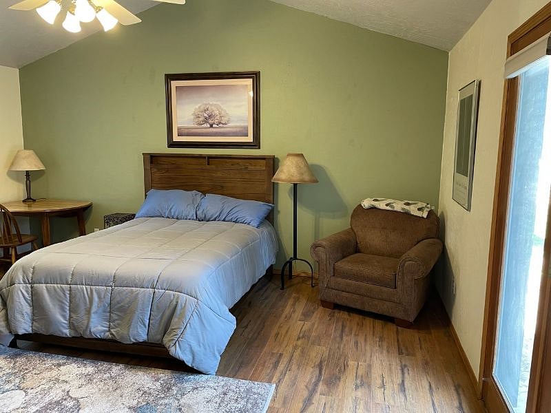 Bedroom with chair and side table