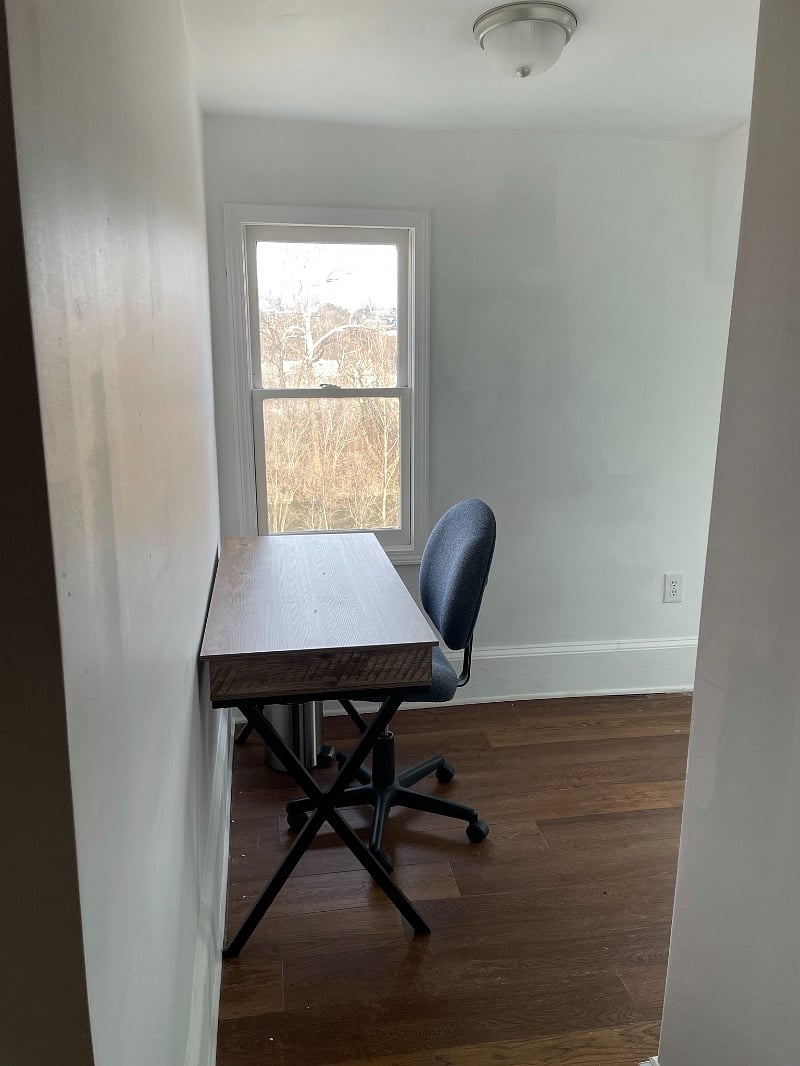 Separate office/laundry room with desk