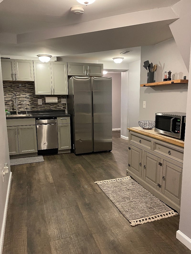 Fully equipped kitchen with full size fridge and small dishwasher.