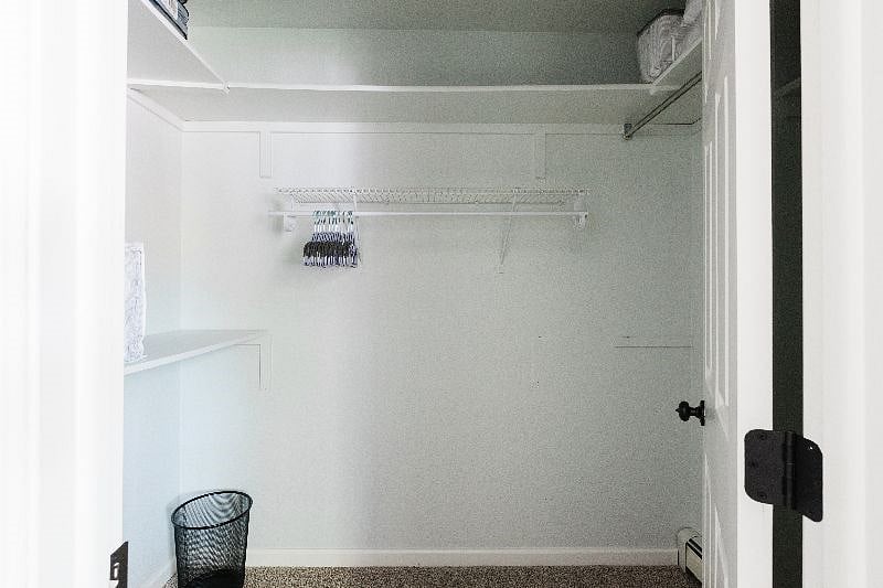 A close up of the walk-in closet in the master suite.