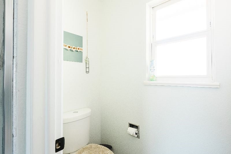 Separate toilet room within the master bath.