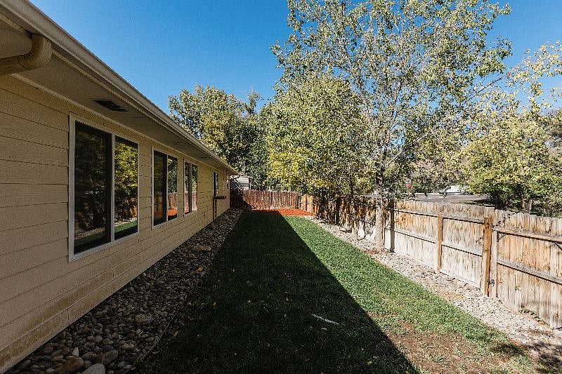 You can enjoy the back yard from the covered patio or through the windows as a very pretty view.