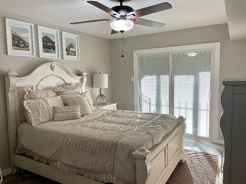 Bedroom & sliding doors out to gated patio