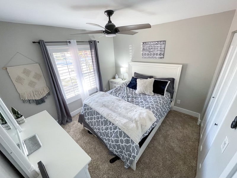 Queen size bed and dresser located in the 3rd bedroom.