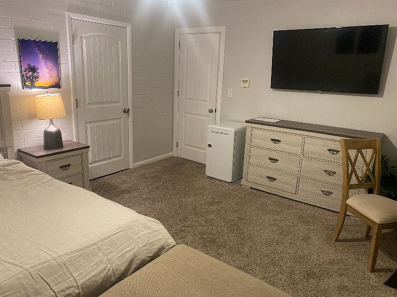 Your room. with large TV with wifi and fire stick, desk, lounge couch and dresser. 