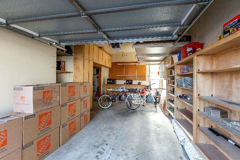Private and secure one-car garage with storage.