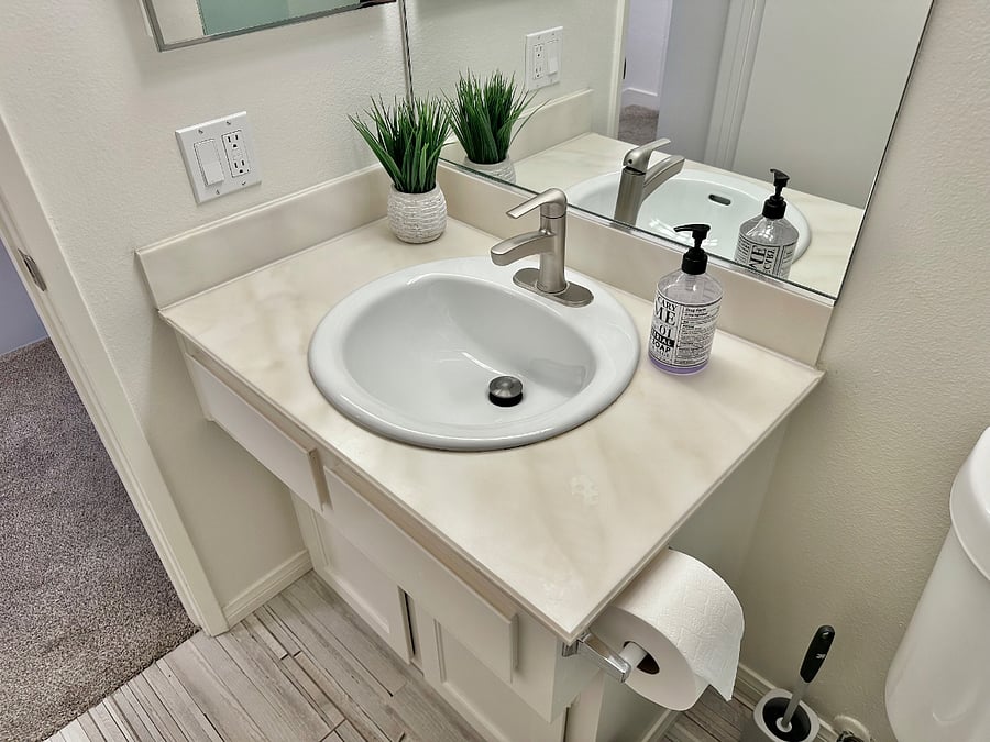 Private bathroom stocked with starter toiletries