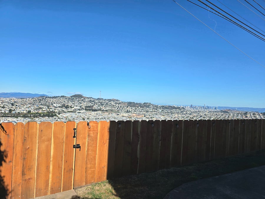 View of Downtown and Bay bridge from backyard