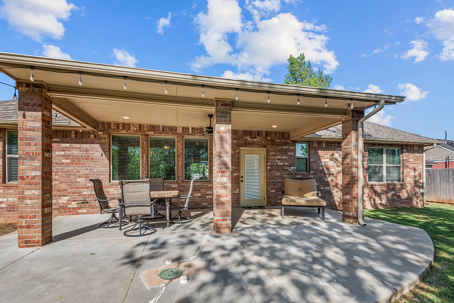 Covered Patio Overlooking the Backyard