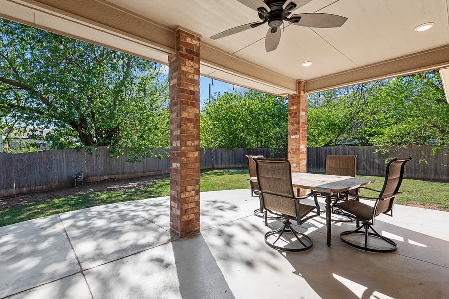 Covered Back Patio with Fenced-in Yard