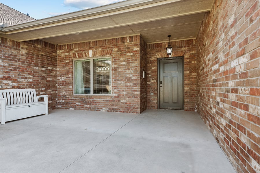 Attractive Brick Exterior with a Welcoming Front Porch