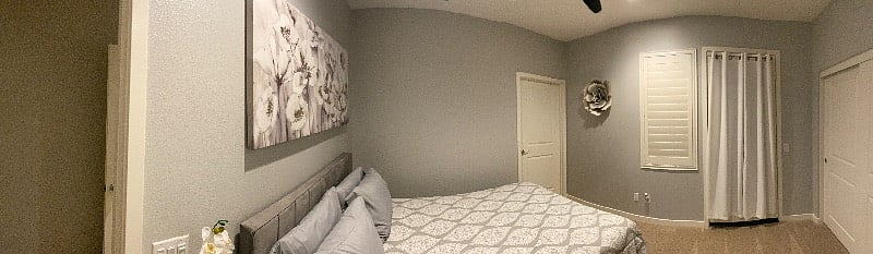Bedroom with an exit to private gates patio
