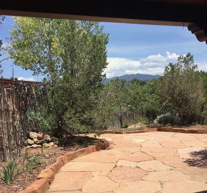 The queen bedroom view in July.
