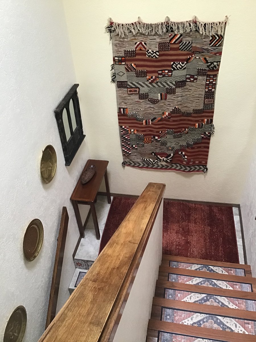 The stairs down to the Moroccan room, laundry room and garage.