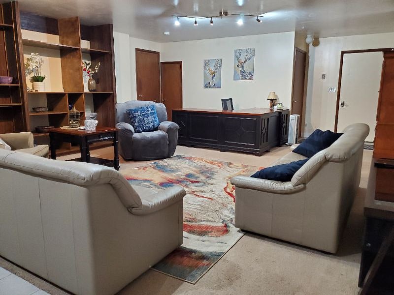 This spacious open plan living room used to be a dance studio.
