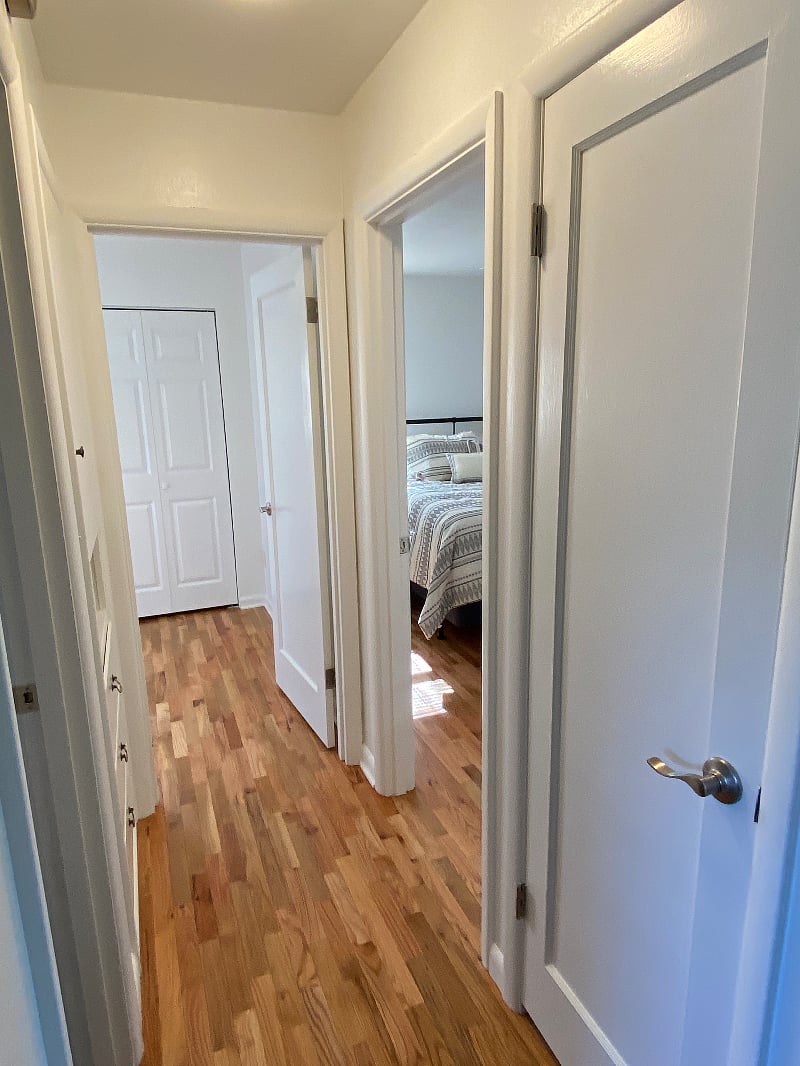 Hallway to bedrooms, with built-in storage