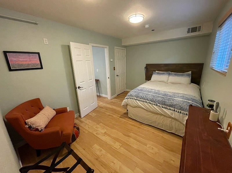 Bedroom with queen bed.