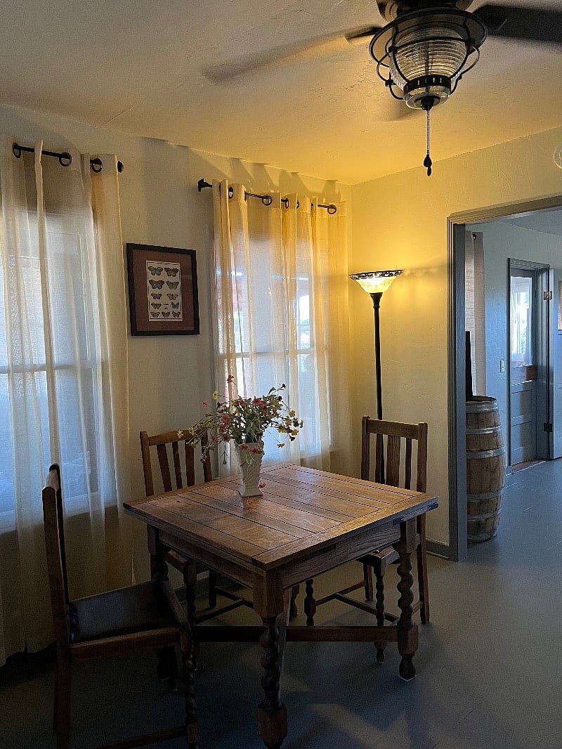 dining room adjoining living room (table expands to seat six)