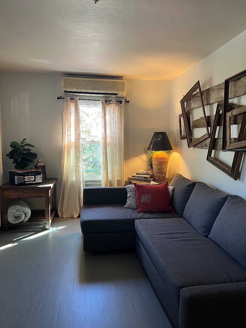 Couch makes out to a queen size bed. View of distant city lights. Turntable/radio. AC