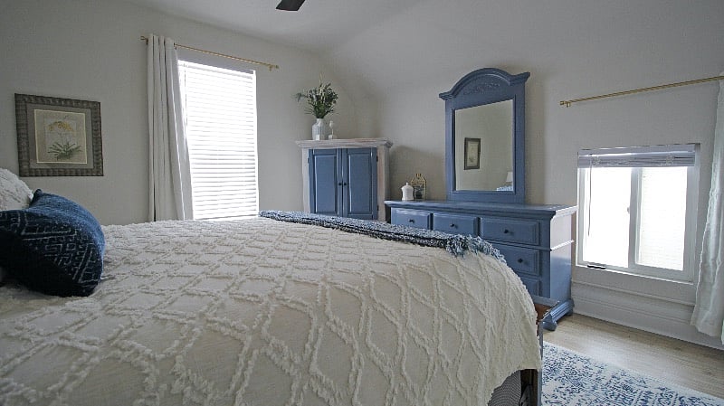 Main bedroom Large dresser and armoire for storage.