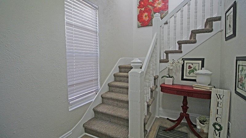 Locked entryway and stairs to unit.