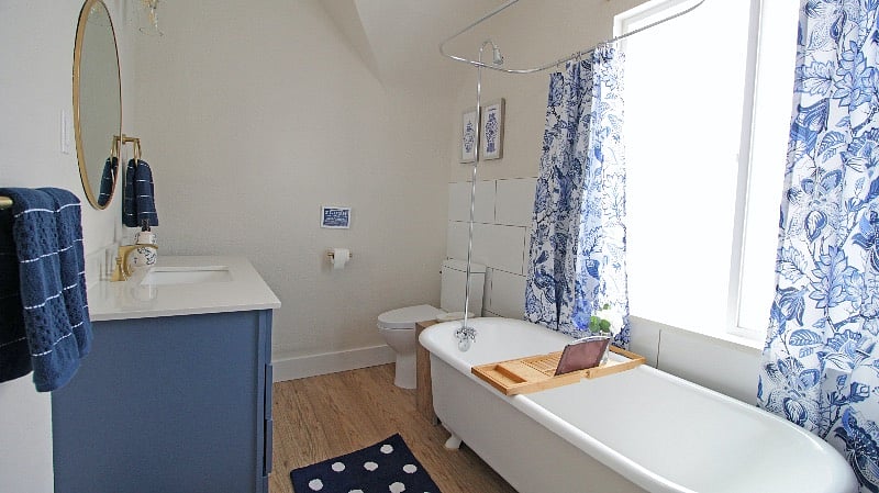 Romantic updated bath. Clawfoot tub with shower.