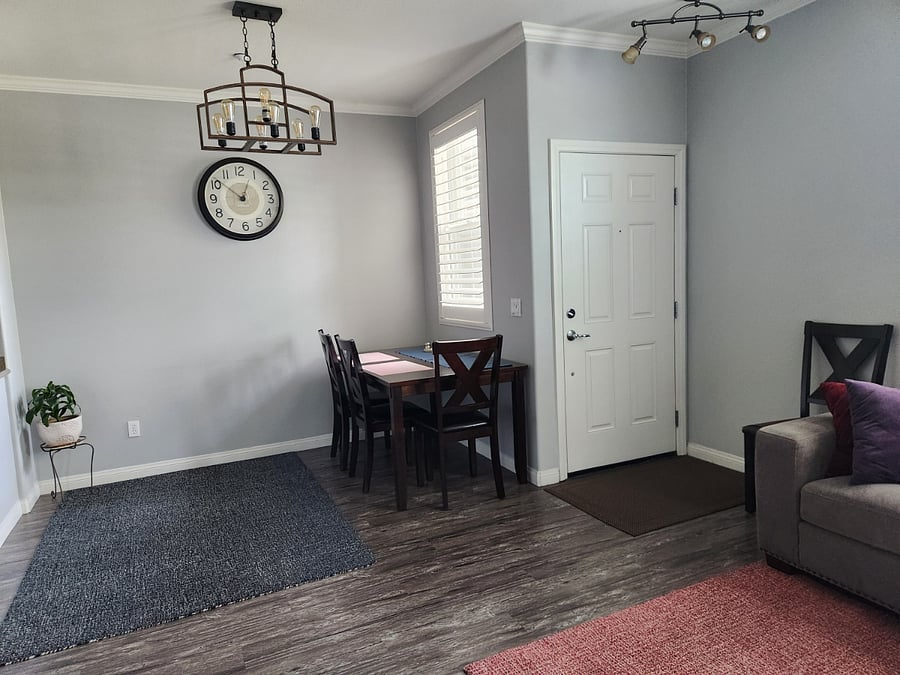 dining area and front door to patio. kitchen to your left. living area behind you