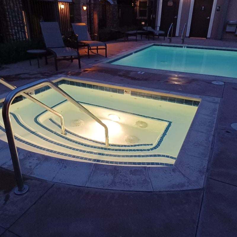 our community's gated jacuzzi and pool are open 7am-10pm.