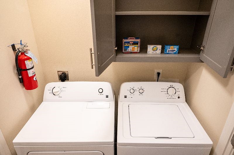 Fully-stocked laundry room.