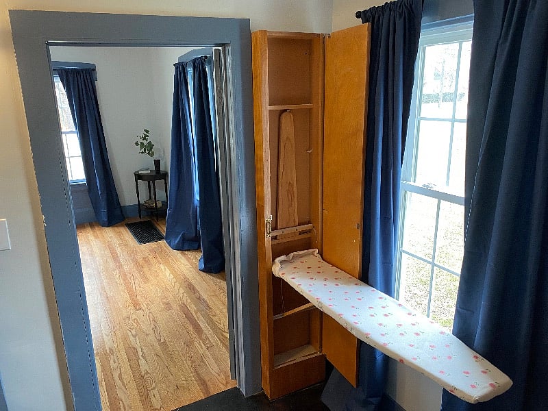 Laundry room includes original built in ironing board