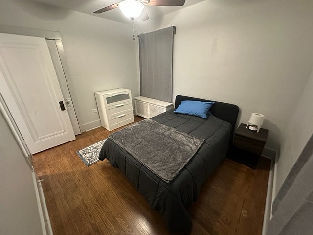 Full bed, dresser, nightstand, white noise machine, lamp, ceiling fan, blackout curtains