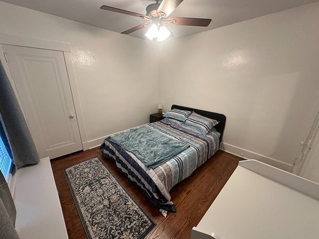 Queen Bed, white noise machine, dresser, ceiling fan, closet, night stand, lamp, blackout curtains