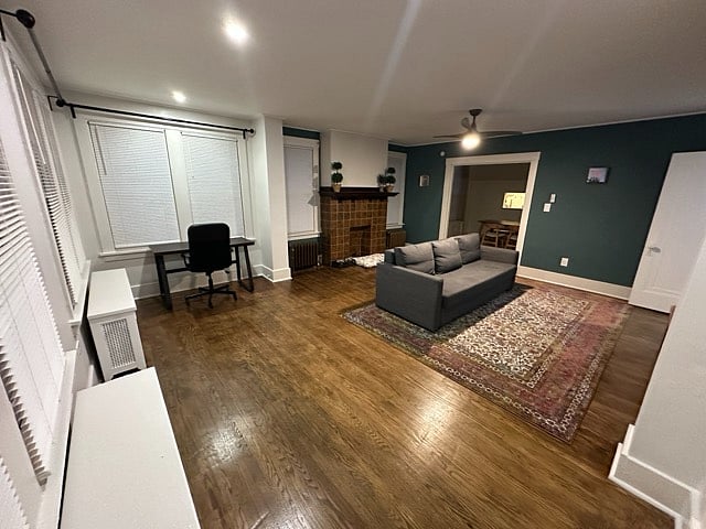 Living room, desk, desk chair, power strip/charger