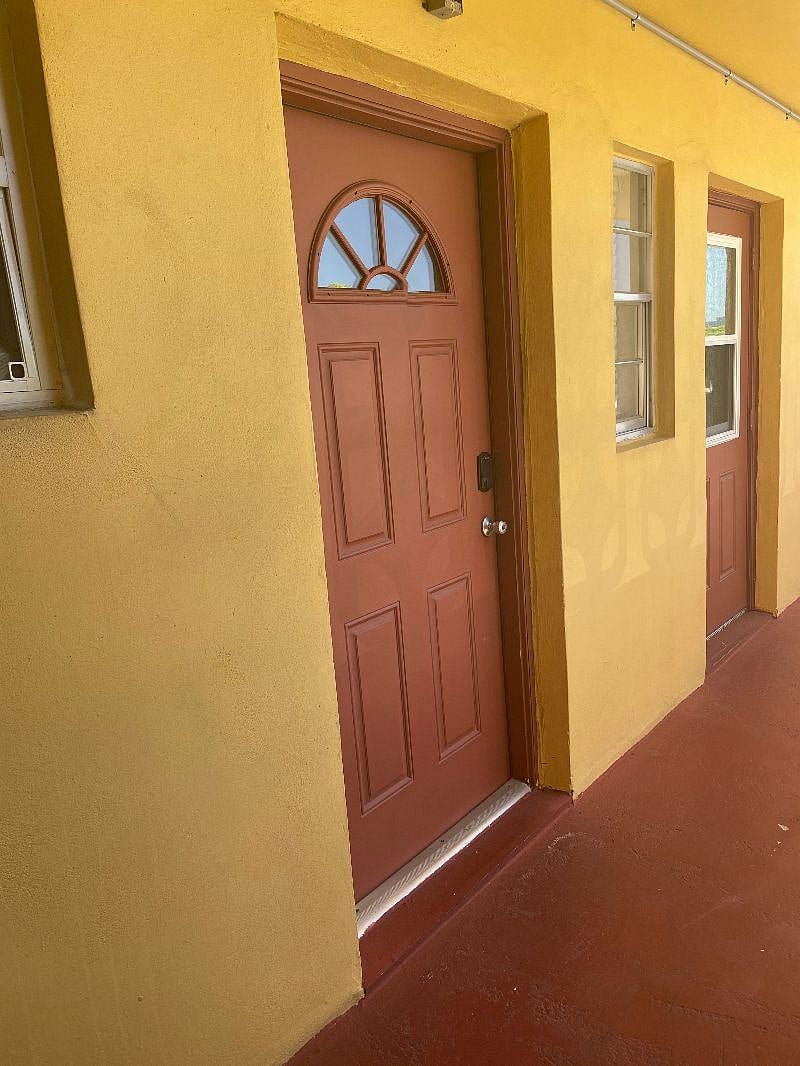 Entrance with code keypad.