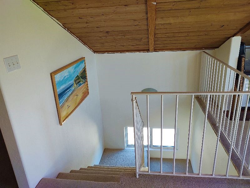 Stairs from bedroom loft to living area