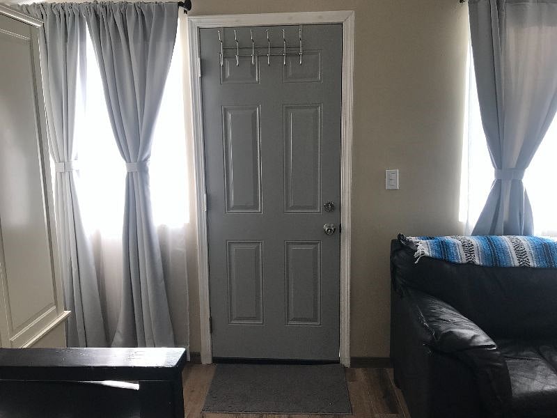 Large bright windows on either side of the door. The front door is equipped with a deadbolt for your comfort.