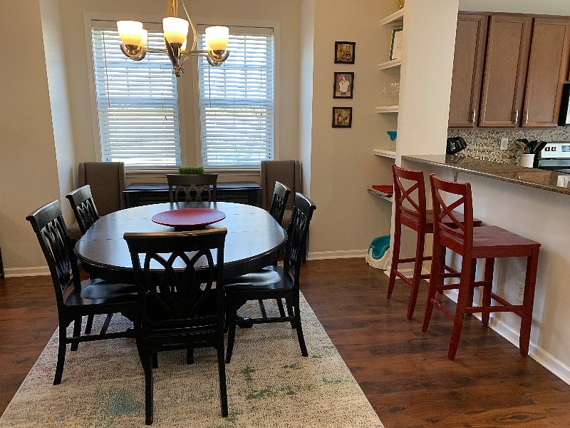 Up the stairs to 2nd floor you enter the open concept main area.  Dining in front of you.  Kitchen to right, Living to the left.