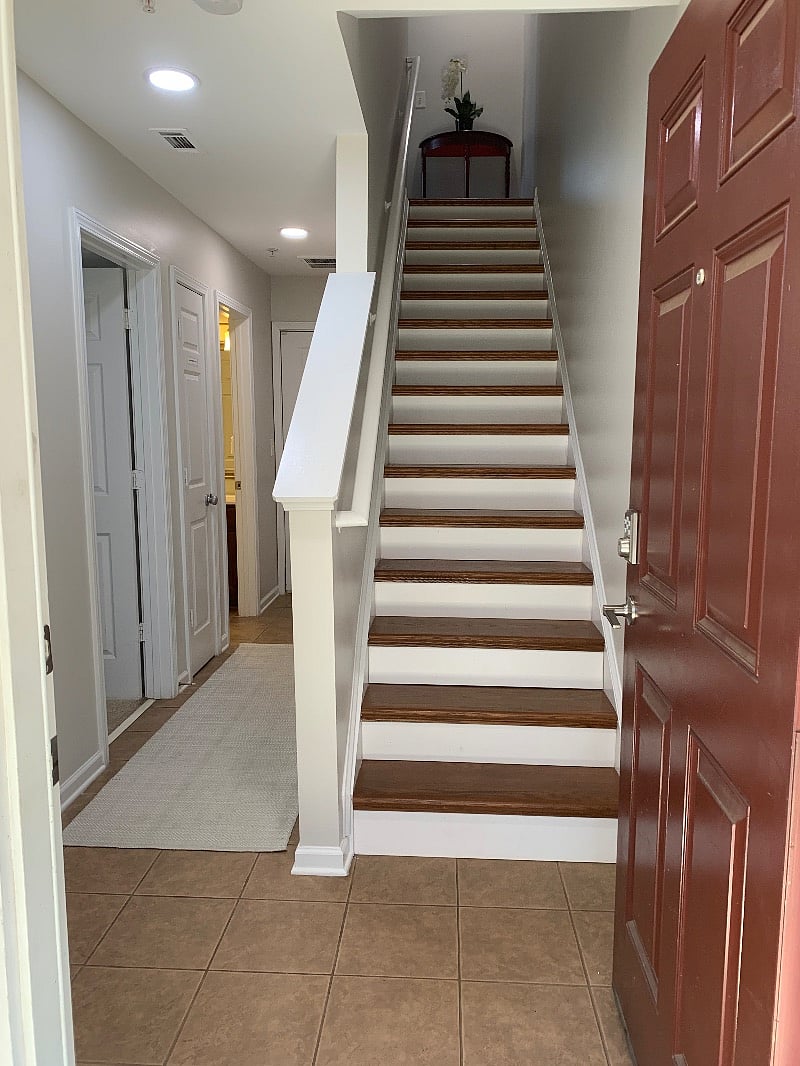 Ground Floor entry.  First door on left is ground floor guest room.  Small 2nd is small hall closet, 3rd door is the guest full bathroom.  Straight down hall is access to attached single car garage.