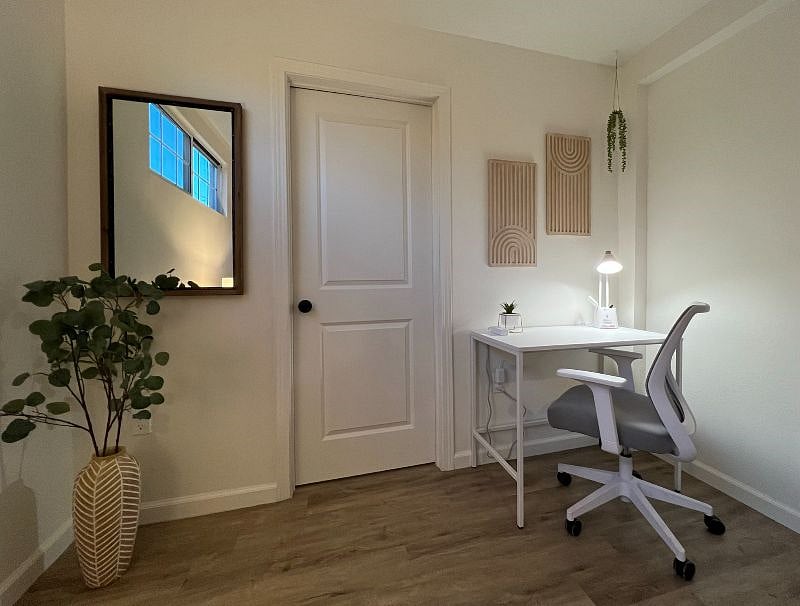 Well lit desk area with charging station