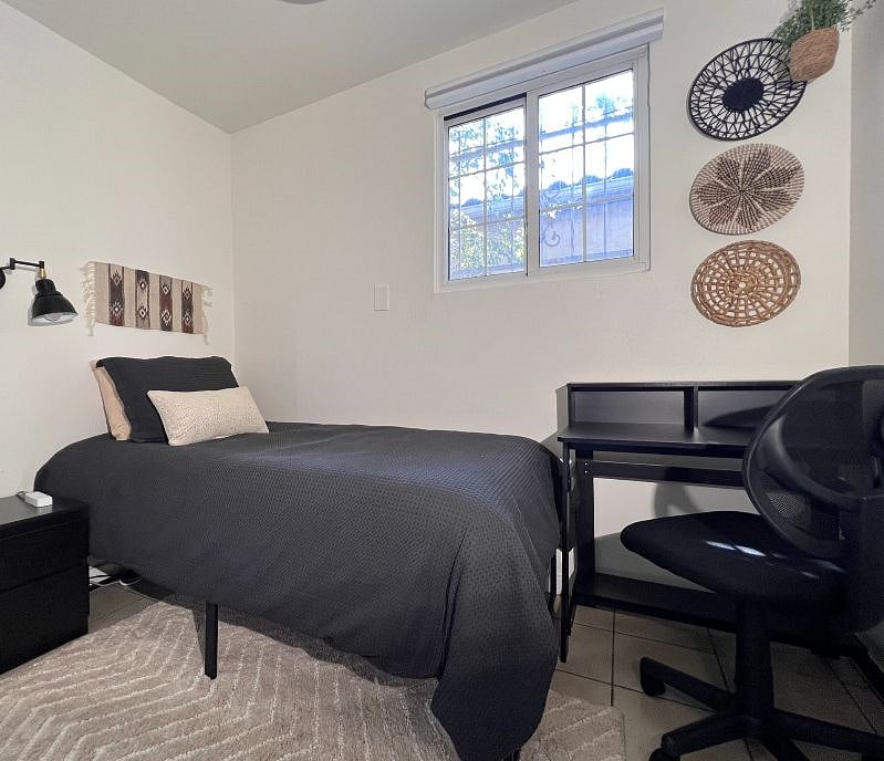 TWIN BEDROOM with large closet, Quality Linens, New Quality Mattress, Great Natural Light and Room Darkening Window Treatments for a great night's sleep!  Desk Nook with comfortable office chair