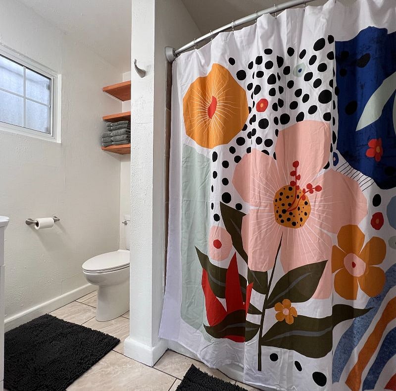 BATHROOM with great Natural Light and a bathtub for a well deserved relaxing soak!