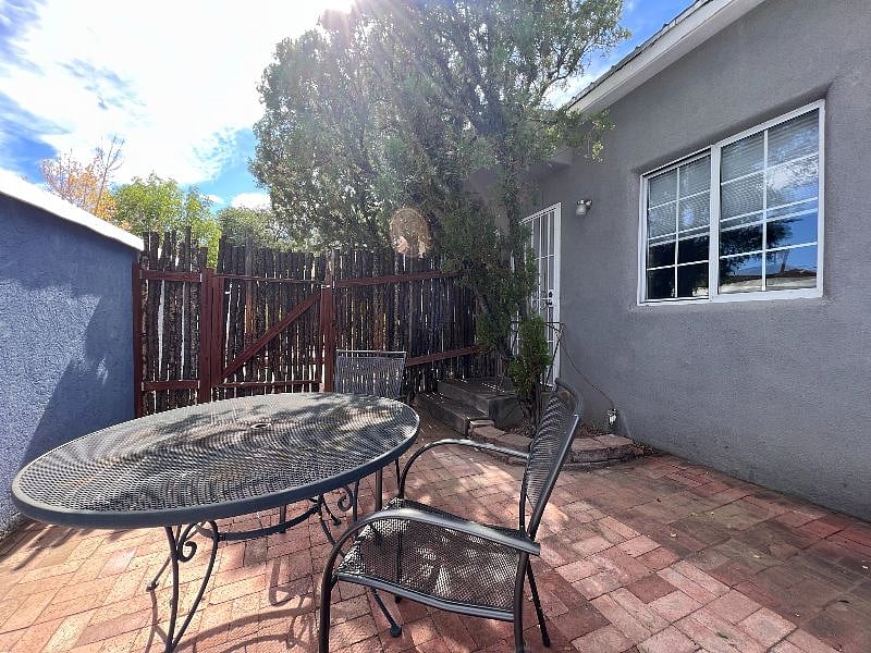 Private Patio with Table and Chairs