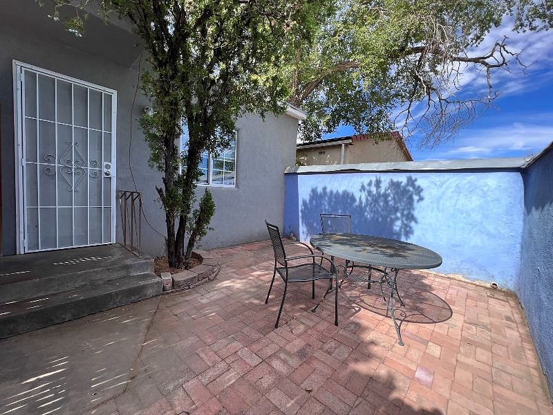 Private Patio with Table and Chairs