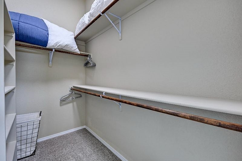 large walk in closet master bedroom