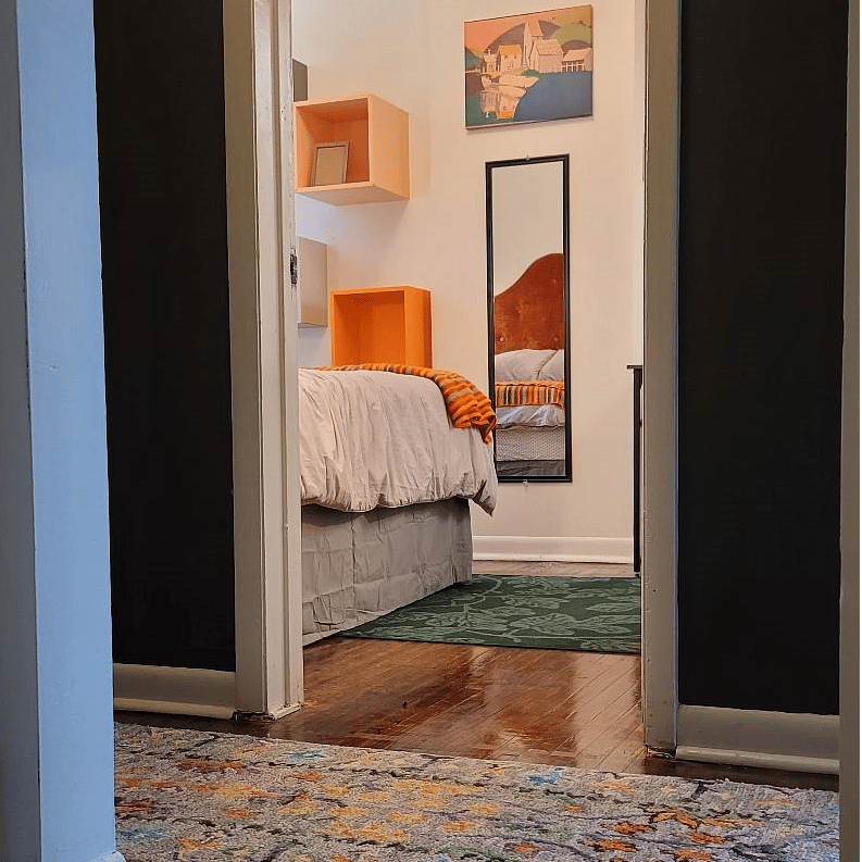 Hardwood floors, room freshly painted.