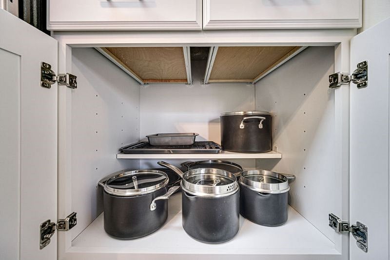 Full set of pots, pans, and baking sheets provided.